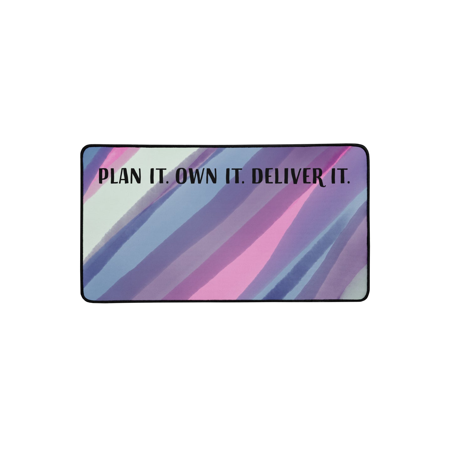 Colorful abstract desk mat with the quote 'Plan It. Own It. Deliver It.' in bold lettering, designed for women project consultants and entrepreneurs