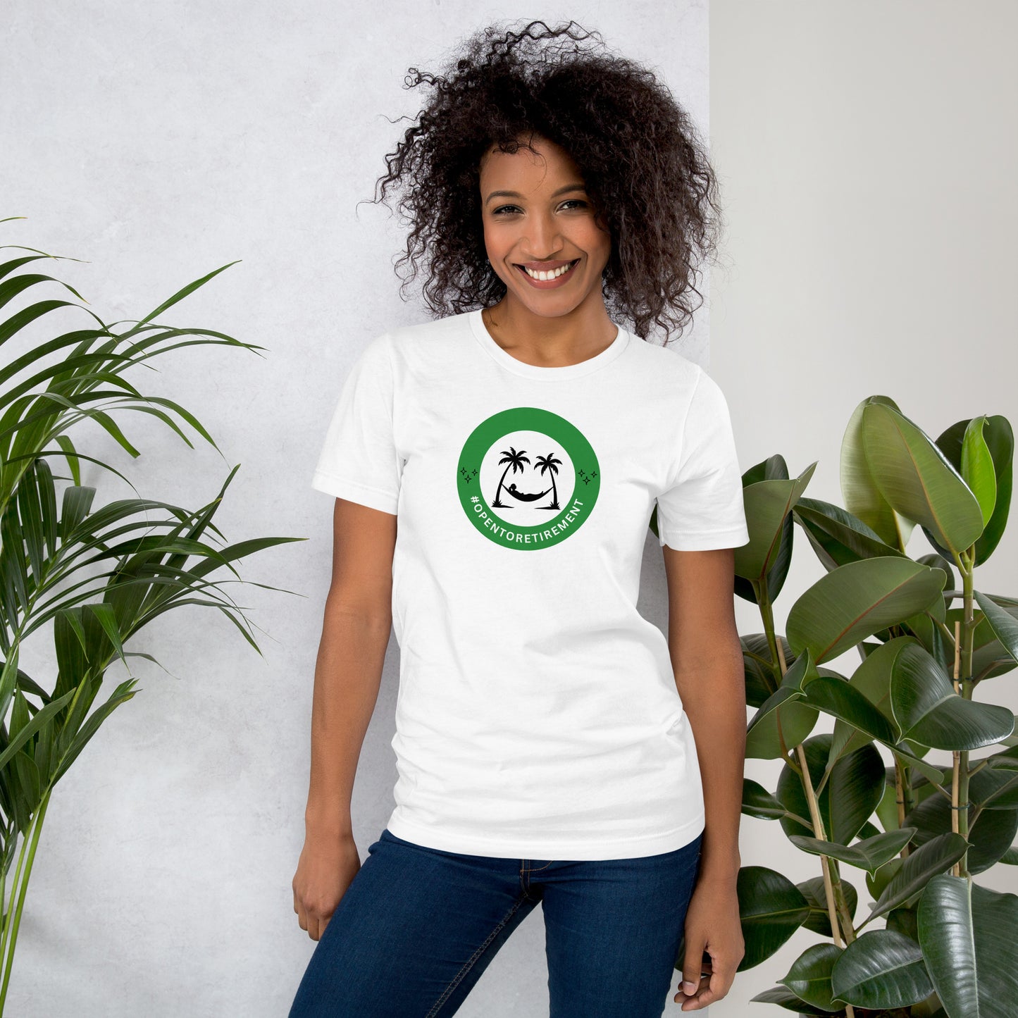 T-Shirt that has a design that shows a work status badge that says #OPENTORETIREMENT and shows a woman in a hammock between two palm trees.