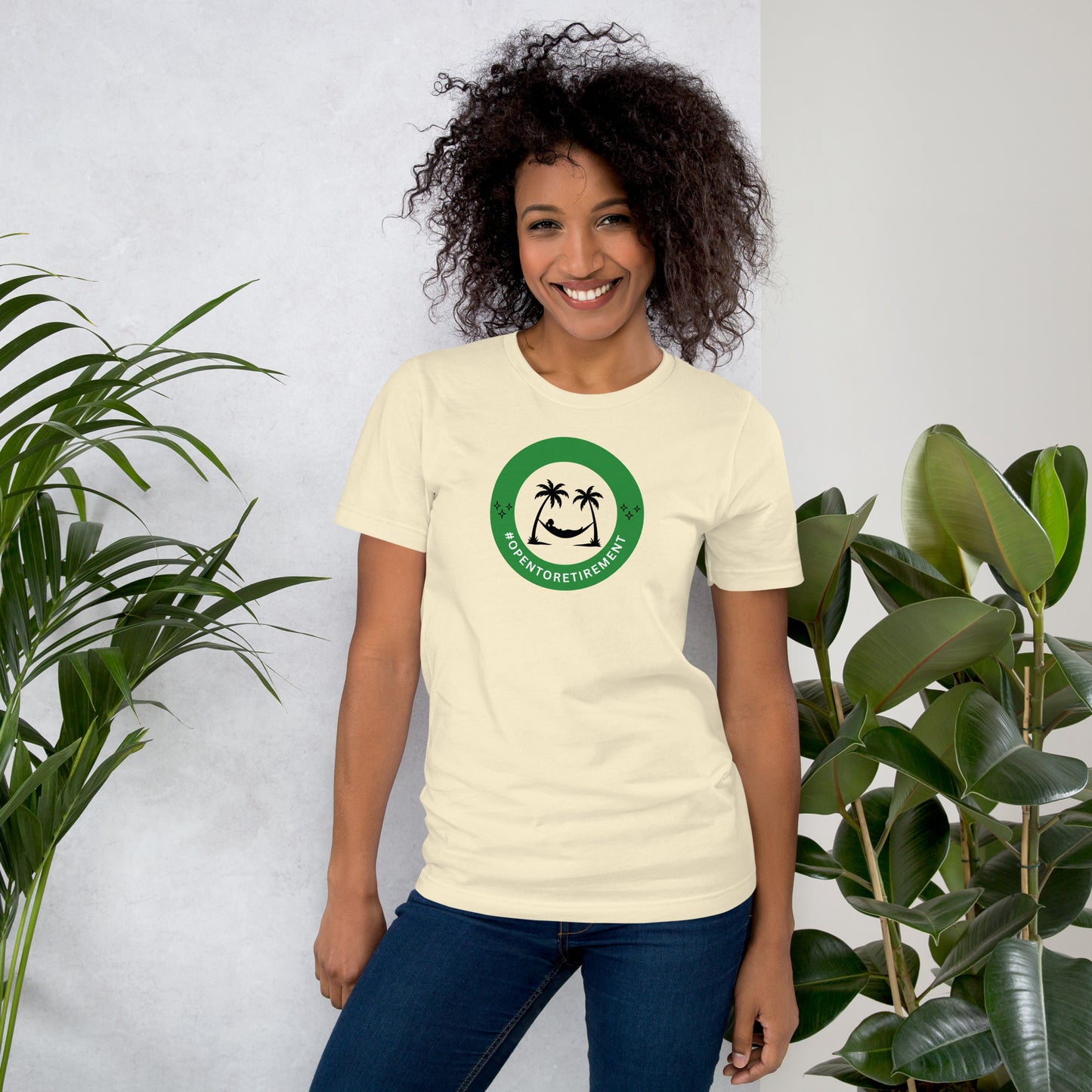 T-Shirt that has a design that shows a work status badge that says #OPENTORETIREMENT and shows a woman in a hammock between two palm trees.