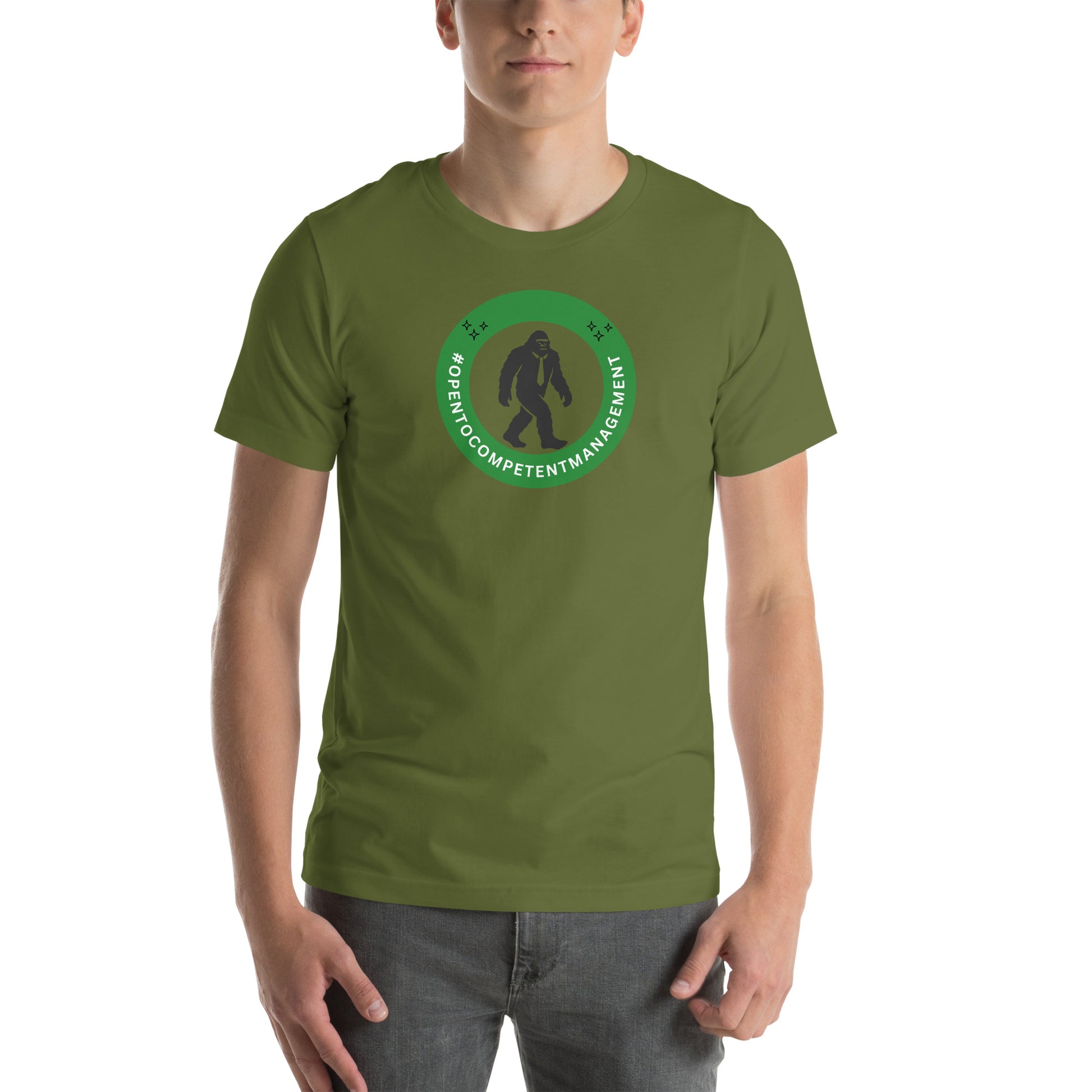 A t-shirt that shows a work status  badge that says #OpenToCompetentManagement with a picture of a bigfoot in a tie.