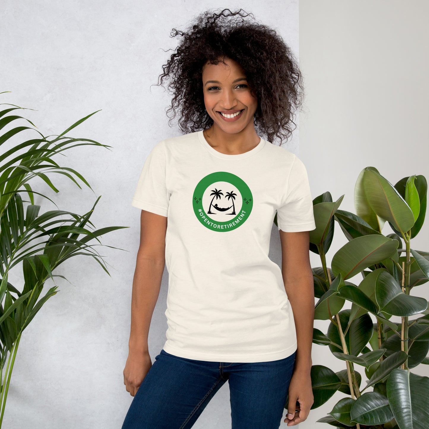 T-Shirt that has a design that shows a work status badge that says #OPENTORETIREMENT and shows a woman in a hammock between two palm trees.
