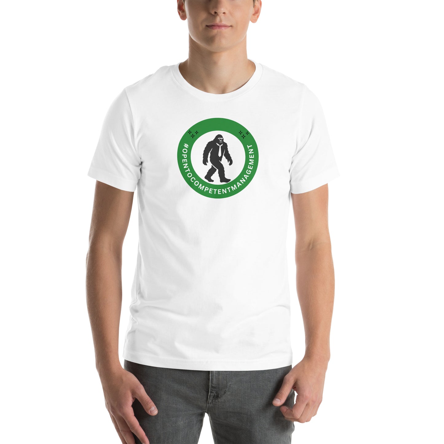 A t-shirt that shows a work status  badge that says #OpenToCompetentManagement with a picture of a bigfoot in a tie.