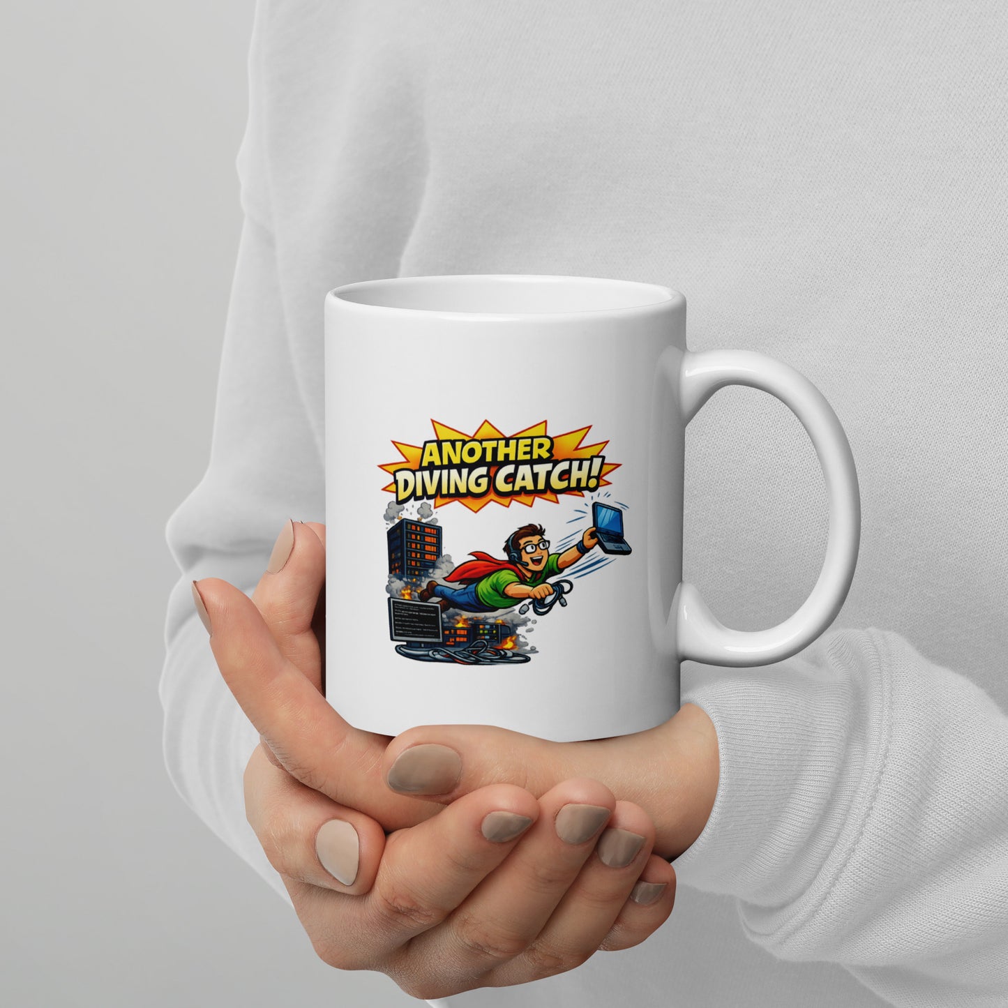 A White Glossy Mug that says Another Diving Catch! and has a picture of an IT engineer saving the day that will make a great gift.