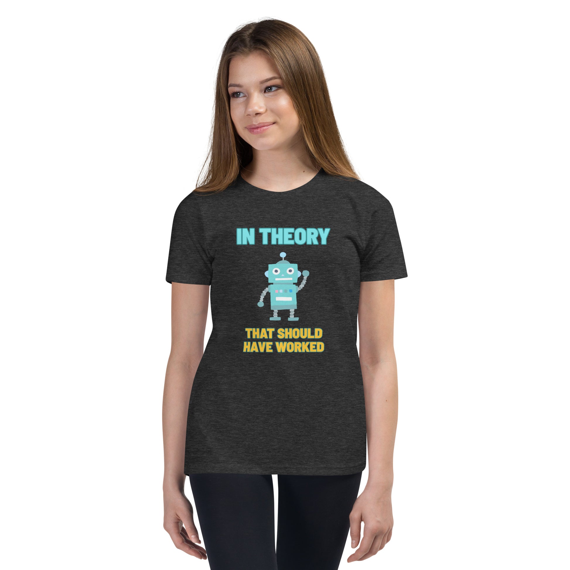 A girl wearing a shirt that says "In Theory That Should Have Worked"