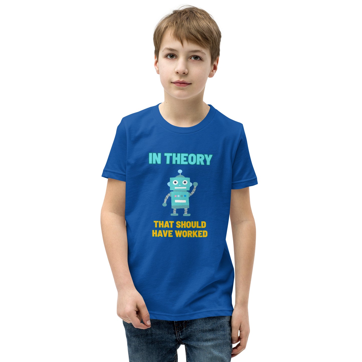 A boy wearing a shirt that says "In Theory That Should Have Worked"