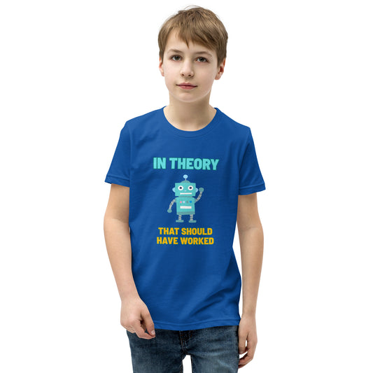 A boy wearing a shirt that says "In Theory That Should Have Worked"